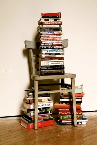 Found chair from home, books, DVDs, peppermint bark tin box4' height